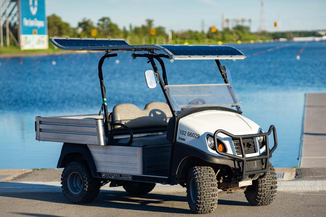 golf cart equipped with a shaped solar panel